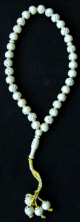 Chapelet "Sebha" blanc casse a 33 gros grains a motifs argentes