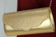 Pochette à rabat paillettes structurée avec chaîne (Sac à main femme) - Couleur dorée Pochette a rabat paillettes structuree avec chaine (Sac a main femme) - Couleur doree