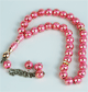 Chapelet "Sebha" de luxe rose 33 grains avec motifs 7 cercles dores