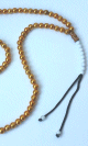 Chapelet dore a 99 perles (Sebha doree) avec 2 separateurs argentes et pompons-compteur