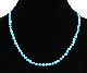 Collier ethnique artisanal imitation perles bleues claires