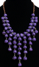 Collier ethnique imitation pierres mauves avec plusieurs rangs pendants agencé de chaînons et d'agréments argentés Collier ethnique imitation pierres mauves avec plusieurs rangs pendants agence de chainons et d'agrements argentes